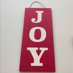 “Joy” wall hanging decor for Christmas. Red, white